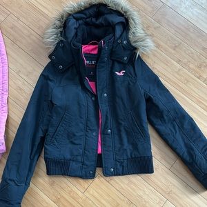 Women’s small Hollister Bomber jacket in Navy blue. Good condition